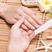 woman-nail-salon-receiving-manicure-by-beautician-beauty-treatment-concept_186202-8769